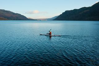 Man in Kayak on a lake